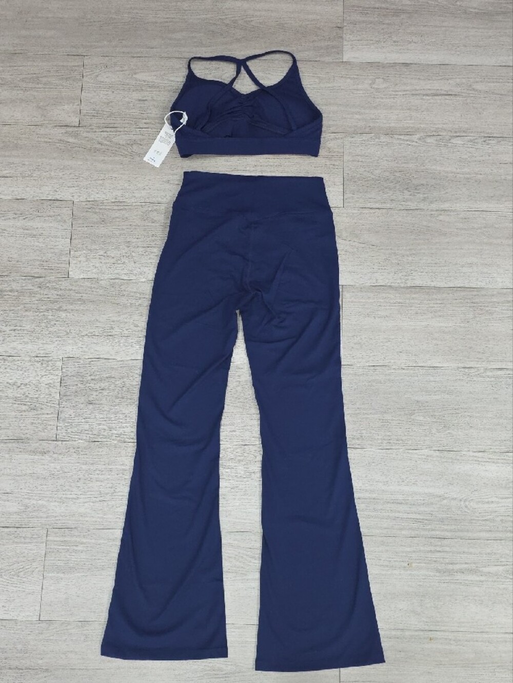 ALO Yoga Navy Boot-Cut Leggings with Strappy Sports Bra Set - Picture 3 of 3
